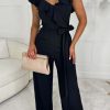 Hot Radiant Senorita Black Wrap Over Ruffle Wide Leg Belted Jumpsuit Jumpsuits